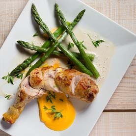 Chicken Gigolette With Carrot Pur&eacutee, Green Asparagus and white wine jus.  